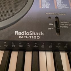 Keyboard with stand, chair, & music books