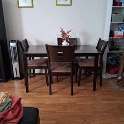 Brown Table With Four Chairs 