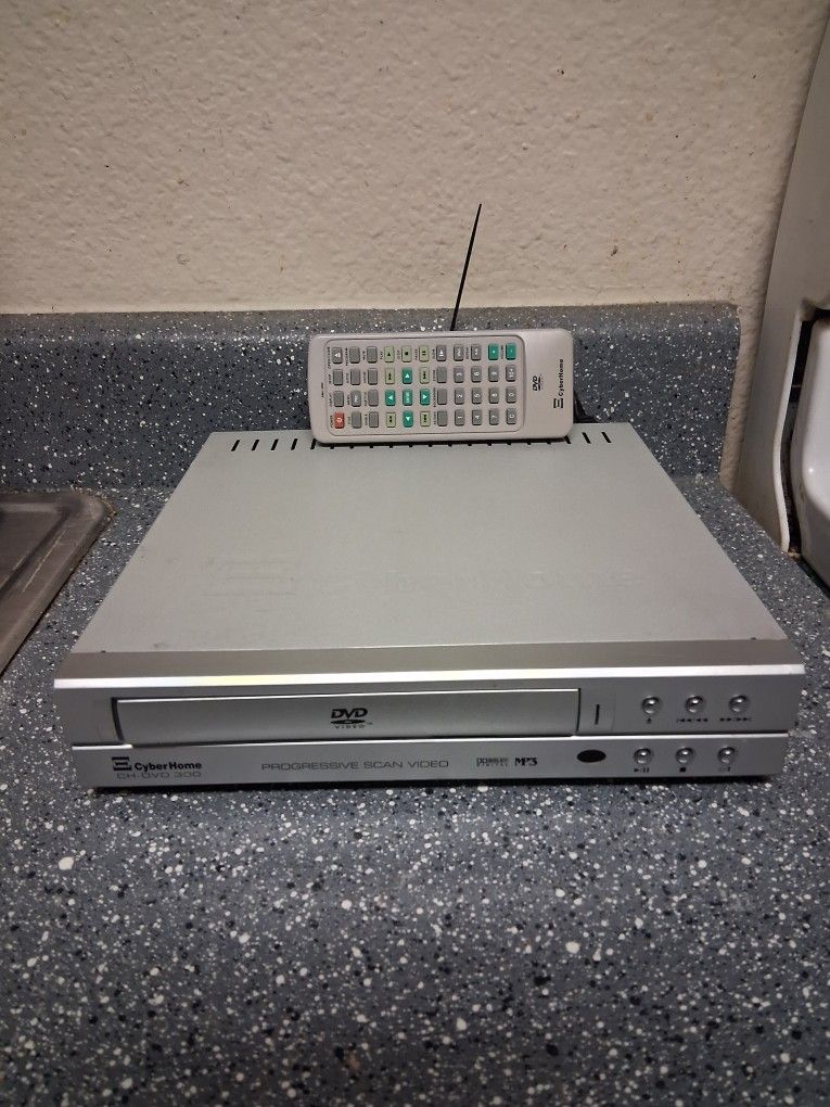 Cyber home d v d player with remote pick up time1:00-10:30 PM Cash Only Huge Moving Sale Read Description Fcfs