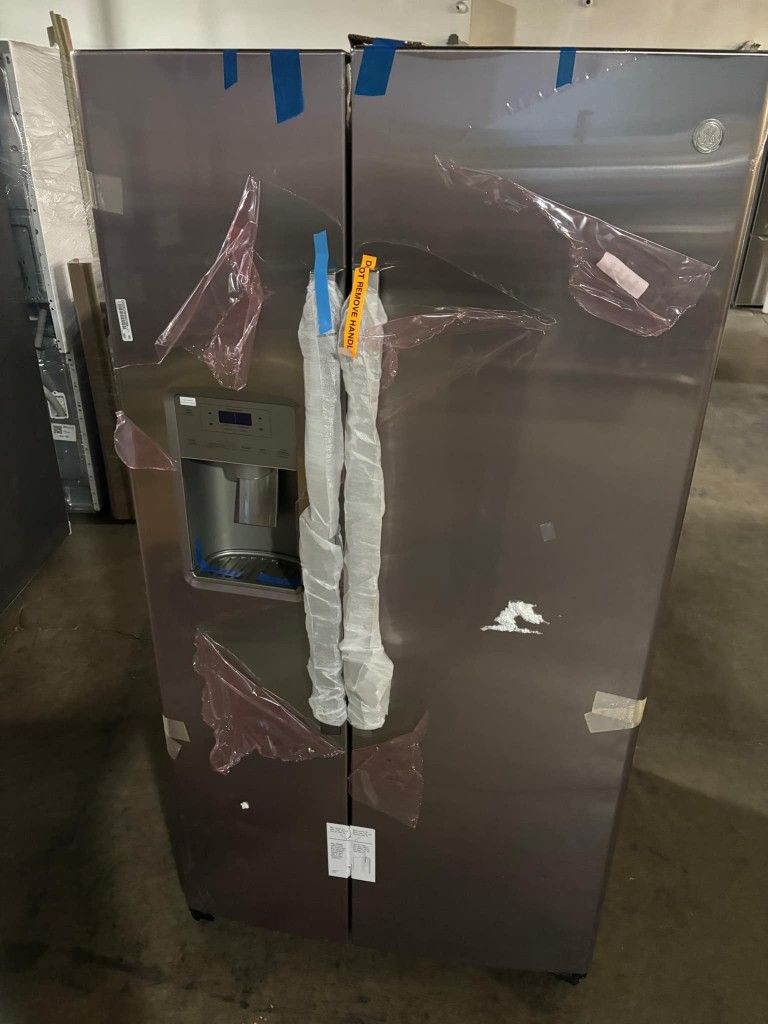 Ge Stainless Steel Side By Side Refrigerator New Open Box