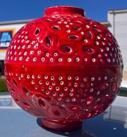 Red ceramic globe lantern or luminary
