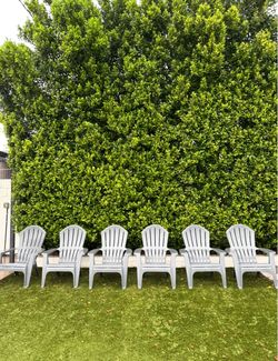 Six Adirondack chairs