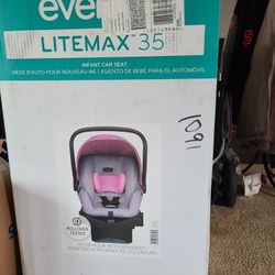 NIB Evenflo Litemax 35 Car Seat In Pink/Gray 