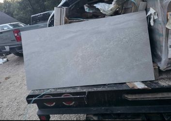 Yardan Gray 24 in. x 48 in. Matte Porcelain Sandstone Look Floor and Wall Tile (15.32 sq. ft./Case
$600 per pallet 
28 boxes per pallet