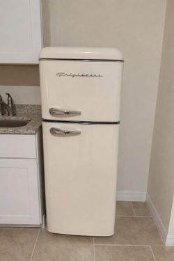 Cream Frigidaire 7.5 cu. ft. top-freezer refrigerator