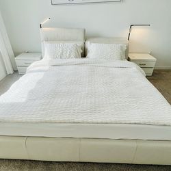 King size genuine leather bed, power adjustable head rest, built in lights with matching nightstands