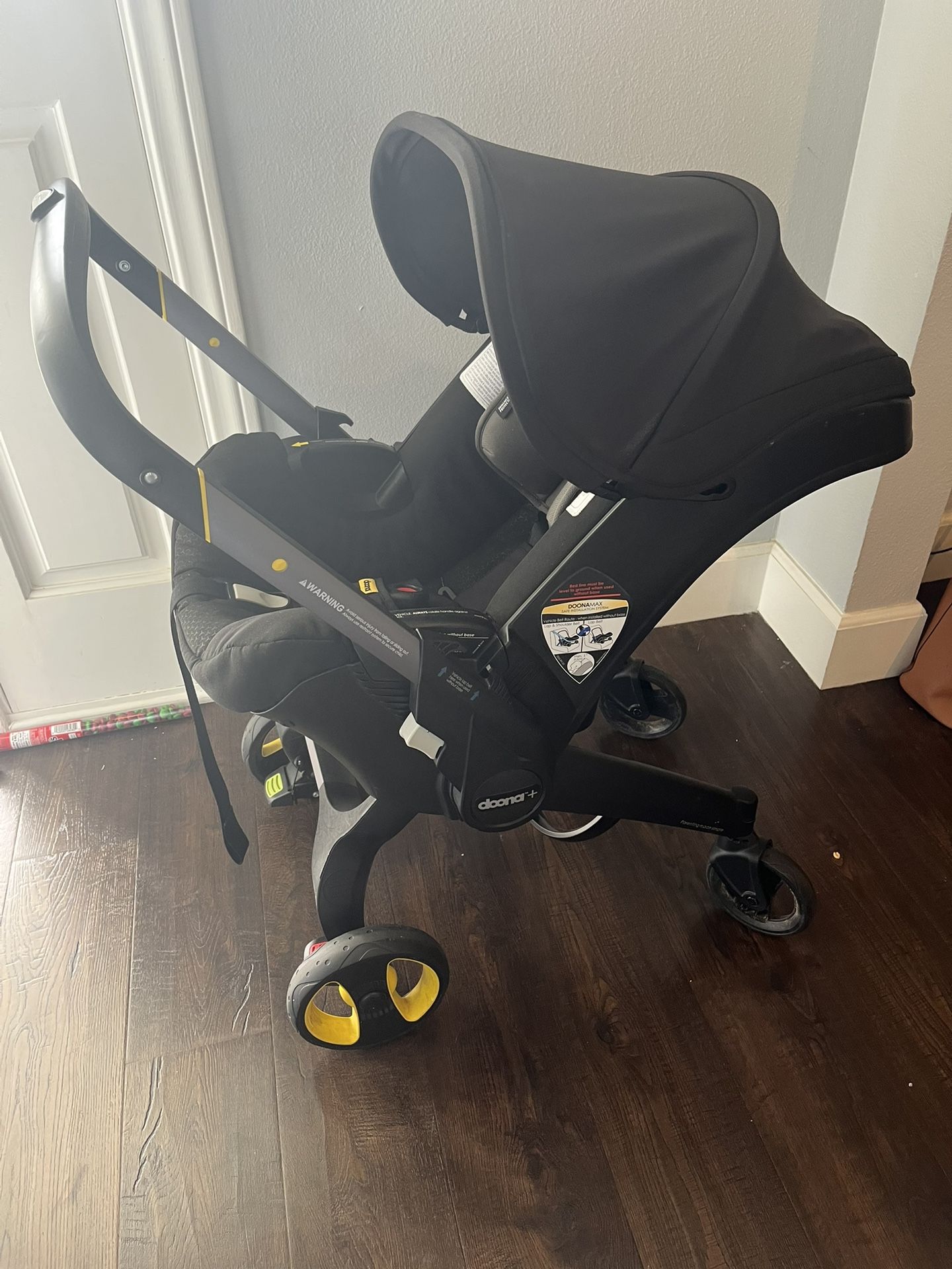 New / Unopened Doona Car Seat & Stroller, Nitro Black