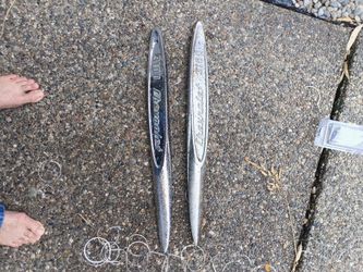 Front fender emblems for a 1957 Chevy 3100