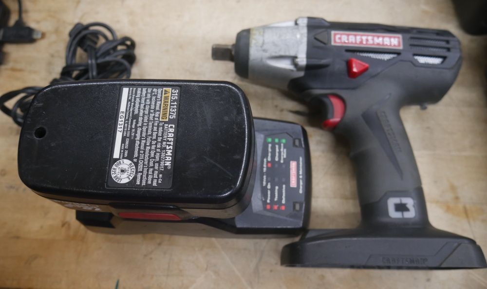 Craftsman impact wrench (contact info removed)20 with battery and charger 886261-1