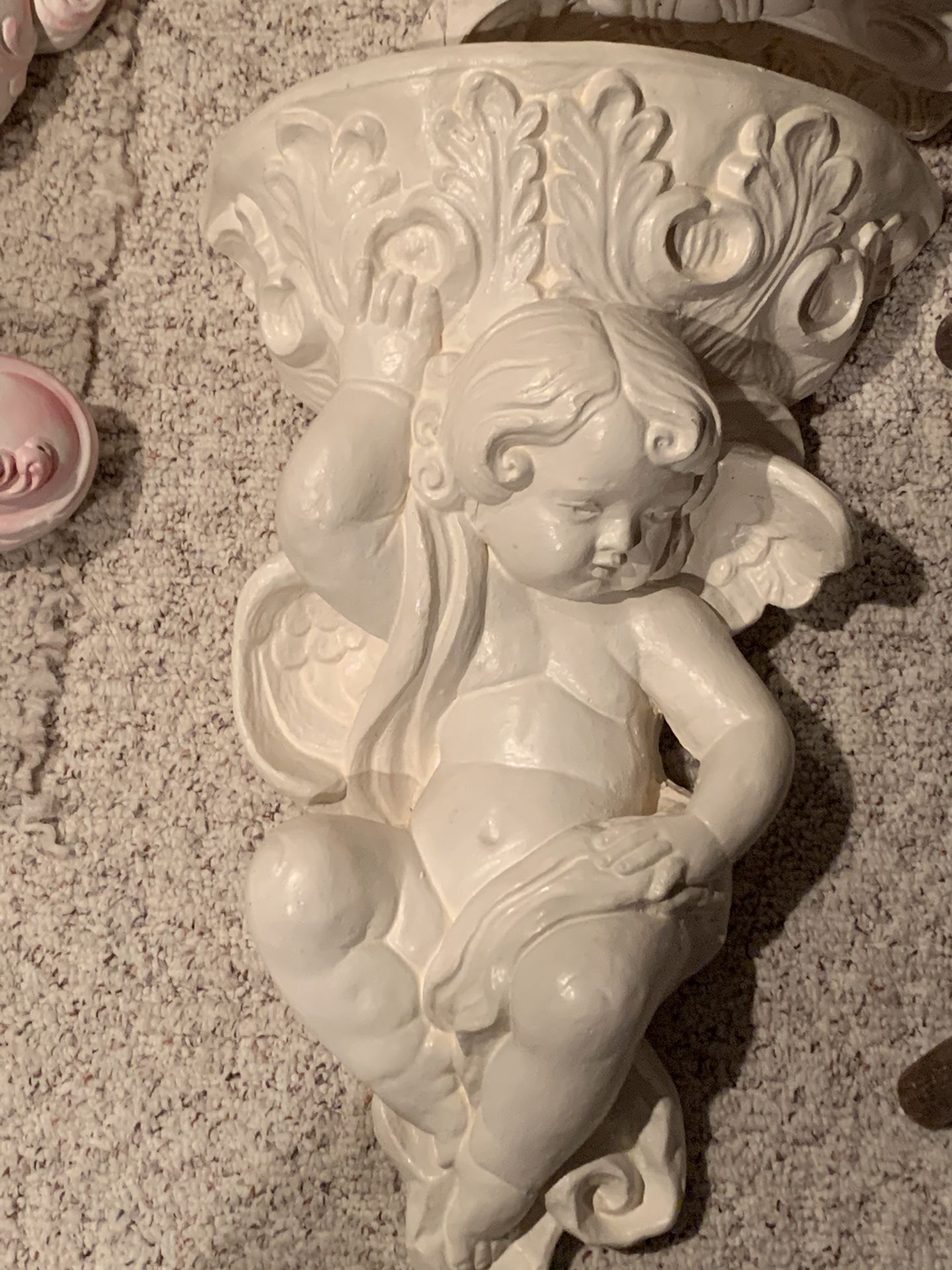 Decorative Cherub Angel wall sconce like brand new , about 26 in tall