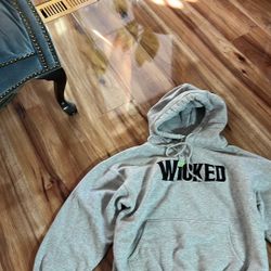 Sweatshirt name on it wicked like the movie out