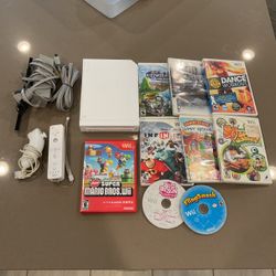 Wii console with games super mario