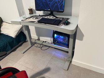 Electric glass table with height adjustment