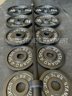 NEW CAST IRON PLATES SET WITH OLYMPIC BAR