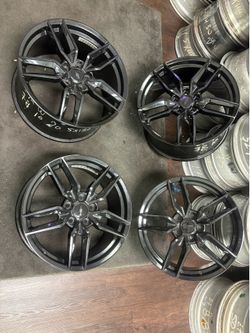 Chevy Corvette rims wheels 20 inch back 19 inch front factory gloss black color 5 lugs bolt pattern 120 mm set of 4