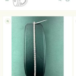 7 inches  18k white gold   27.5 grams   1.65 carats of diamonds   37 diamonds   vs quality   natural diamonds 