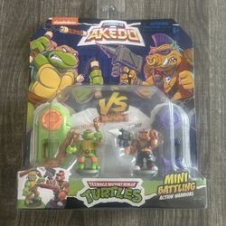 Akedo Teenage Mutant Ninja Turtles Michelangelo vs Bebop Mini Figure Set