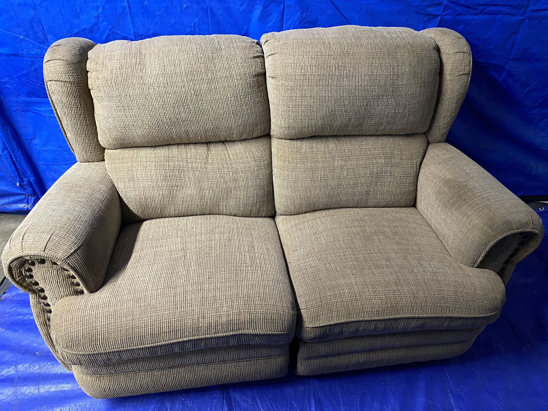 Loveseat For Sale Must Go This Week. One Side Reclines Downtown Westport Area.