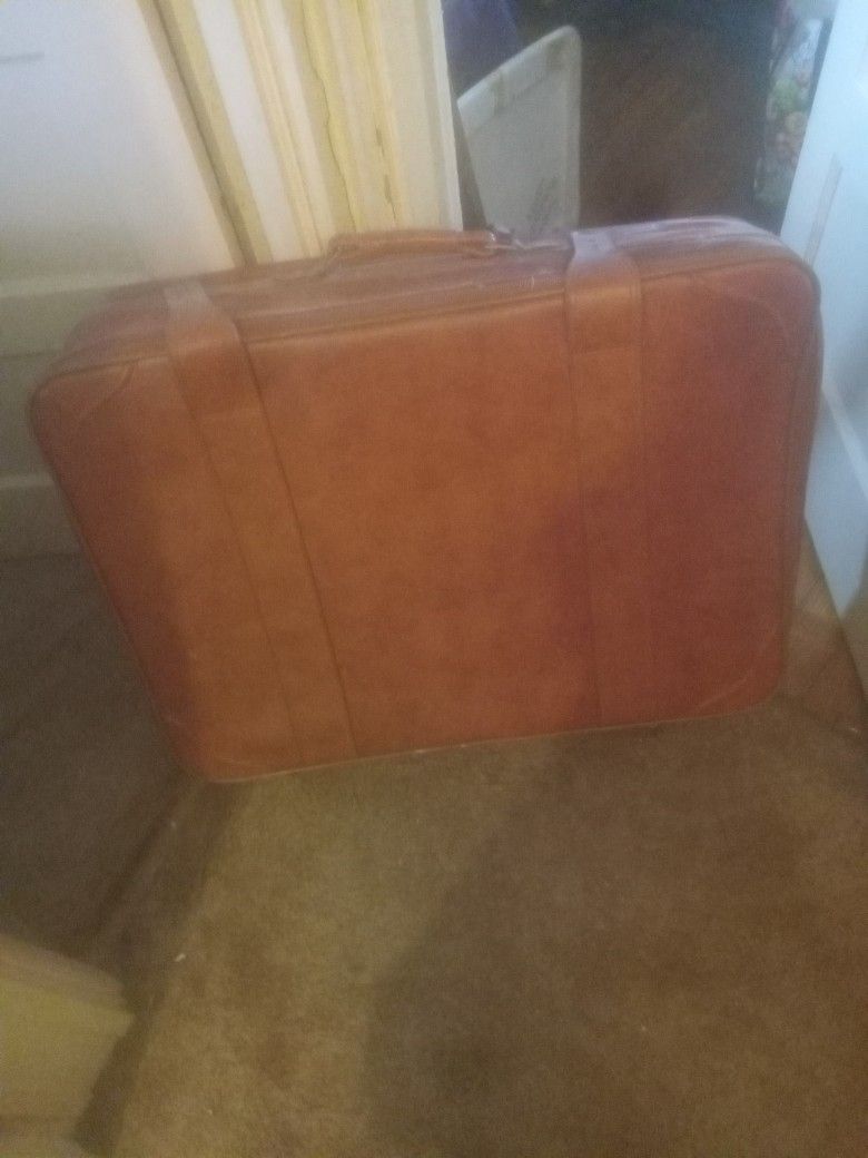 Vintage Leather Rolling Suitcase