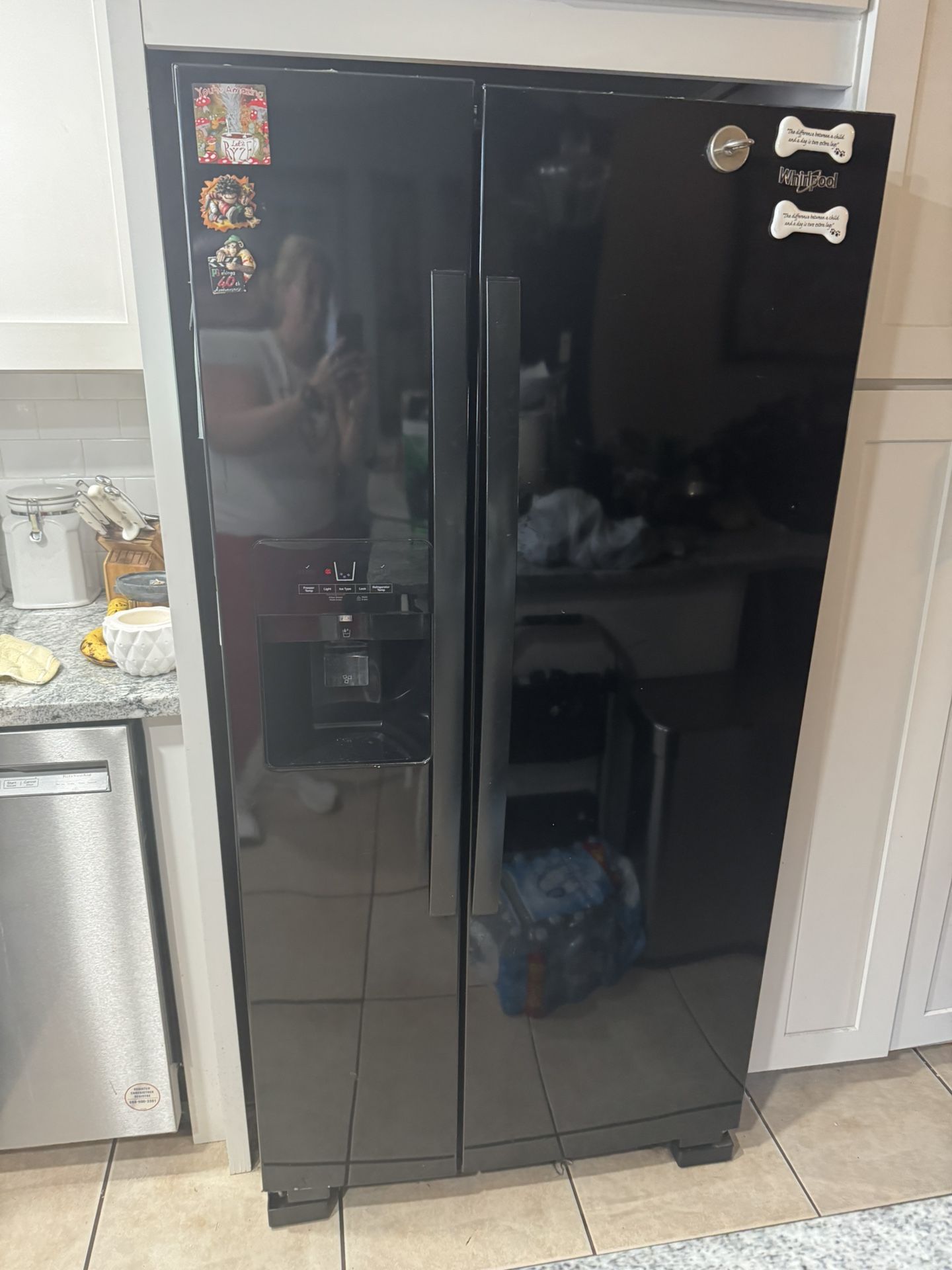 Black Side By Side Whirlpool Refrigerator