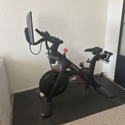Like New Peloton Bike + Accessories (Shoes, Weights, Mat) – Barely Used!