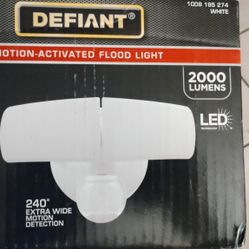 New In The Box Defiant 2000 Lumens Motion Activated Flood Light 