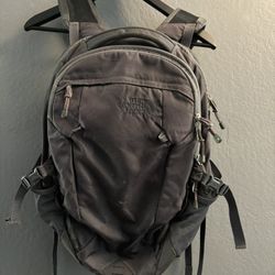 Grey the north face backpack in very good pre loved condition where will it take you ? 