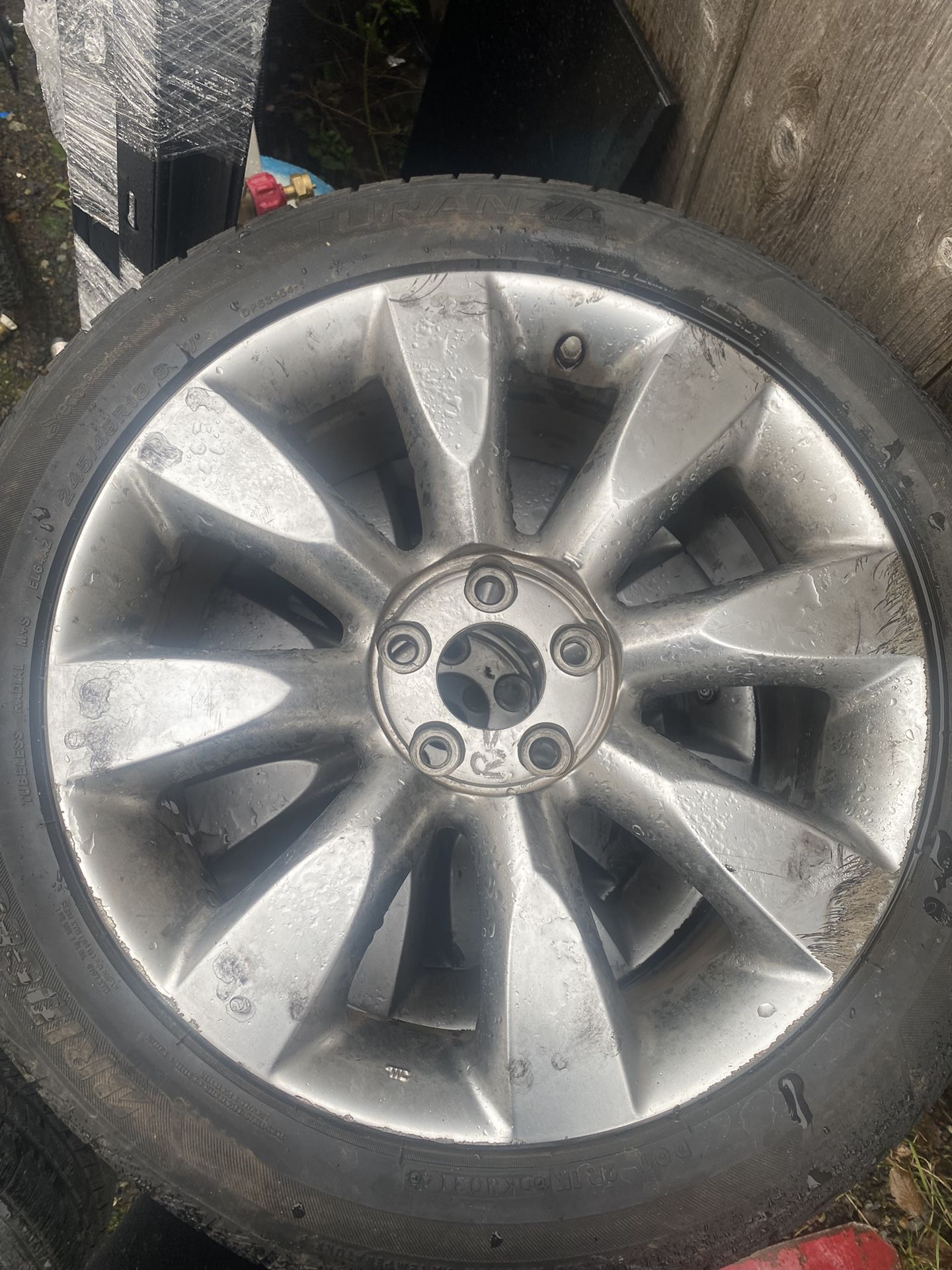 Three Infiniti wheels with tires Pick up in orting