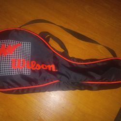 Tennis Rackets -(2),  and Tennis Balls and Tennis Balls and Tennis Carrier.