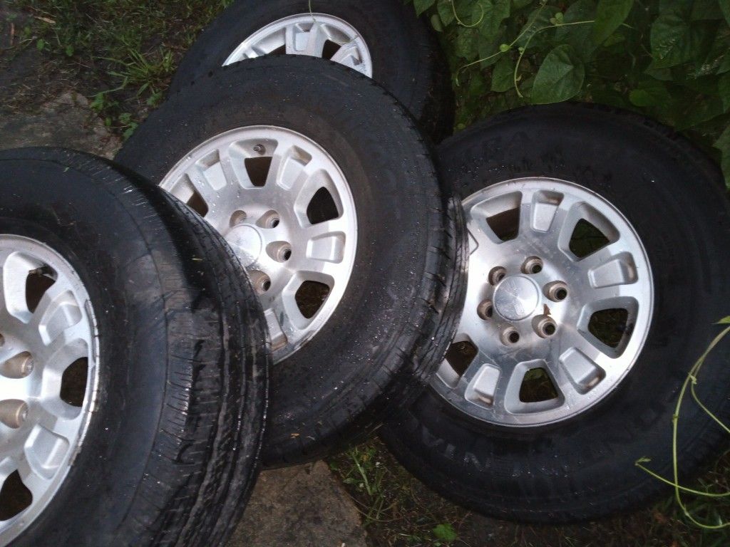 Used but look new tires for Chevy Silverado or GMC