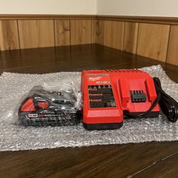 Milwaukee M12/M18 Charger & (1) 2ah Battery 