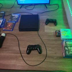 Ps4  With 2 Controlls And Video Games Also A Ver With Controlls And Videogames  
