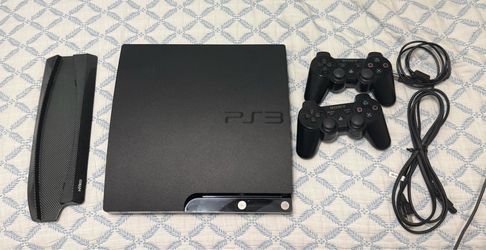 PS3 Console with 2 controllers
