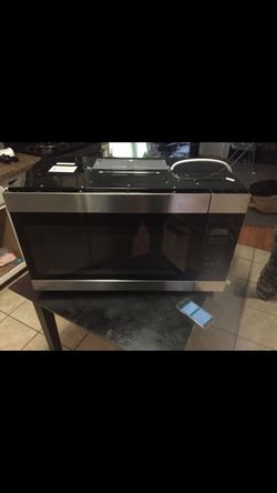 Amana microwave over-the-range.With bracket