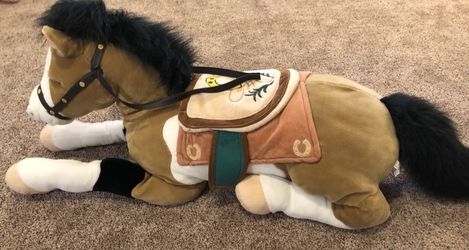 Large stuffed horse with cheap saddle