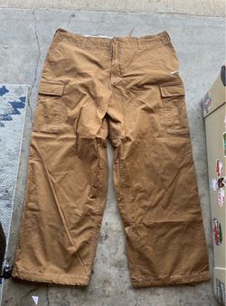 Nike SB brown drawstring cargo pants with white stitching, size 42