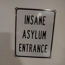 Insane Asylum Entrance sign

Tin metal material. Sturdy. Great for Halloween decorations. 

12" x 9"