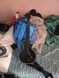Guitar hero instrument controller