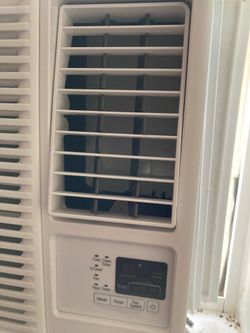 LG brand Air Conditioner / Heater with remote and stand