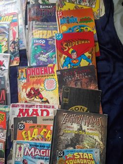 Vintage comic books i dont know much about comic books i got them in a will they were my grandpas so I dont know but 98 percent of them is in plastic 
