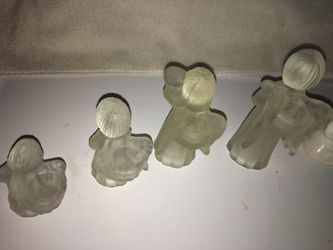 4 Crystal angel candle holders use dinner table candle size and 3 white and green angel nick nacks.