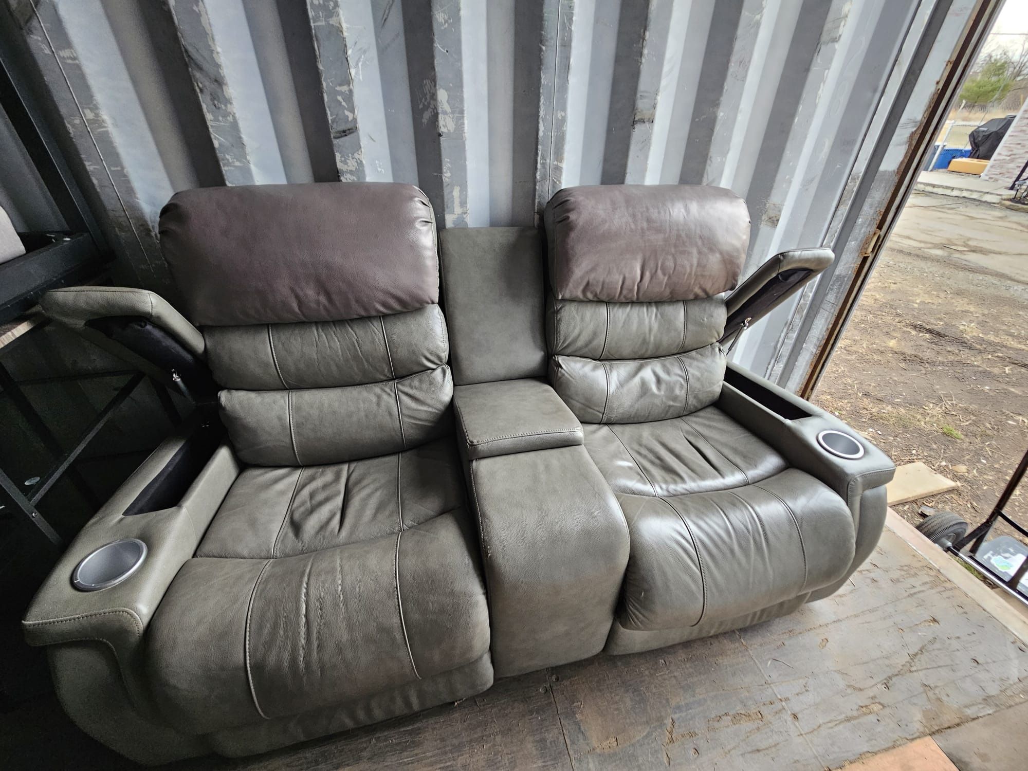 Dwyer Double Reclining Sofa with Center Drop Down Cup Holders