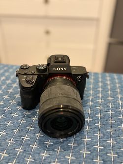 Sony a7iii with 28-70mm lens (COSMETIC LENS DAMAGE)