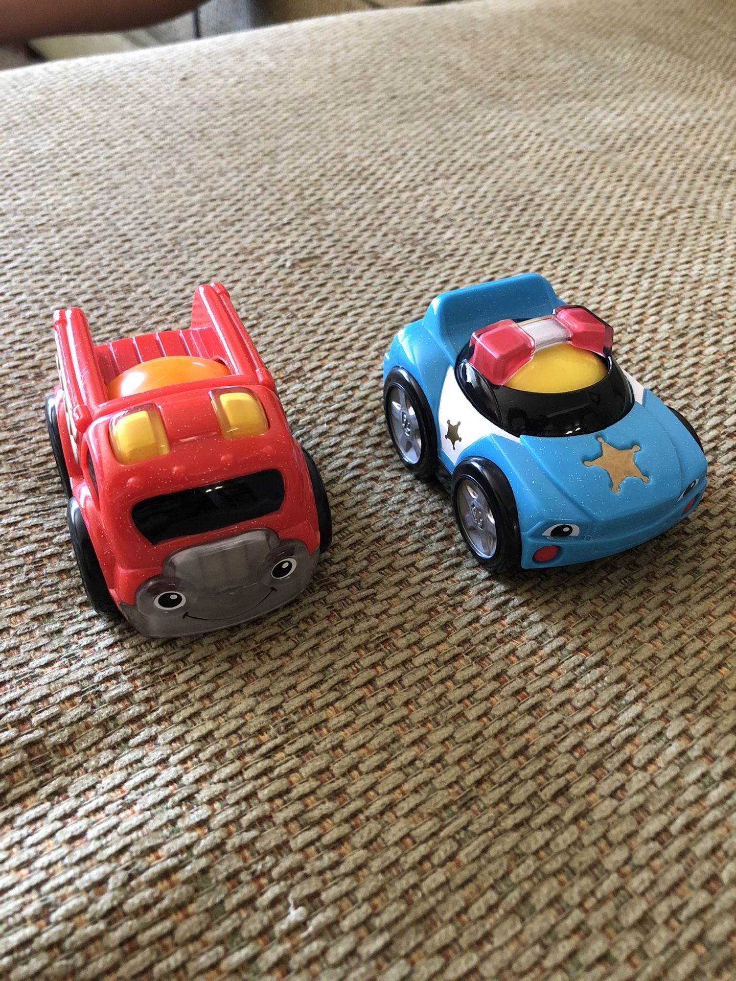 Fisher Price roll n race cars