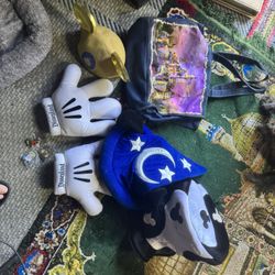 Collectable Disney Memorabilia Collector pins,, Hats, Bag And Gloves!! Three Hats, four pins, one is the 50th Anniversary Hat & two anniversary pins. 