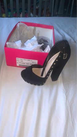 Black pumps with studs