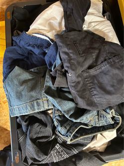 four boxes full of clothes