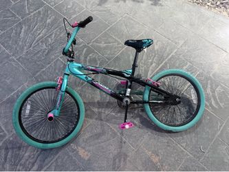 This is a 20-inch Kent Trouble Girls' BMX bike