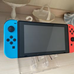 Nintendo Switch V2 (128GB SD Card) + Pro Controller