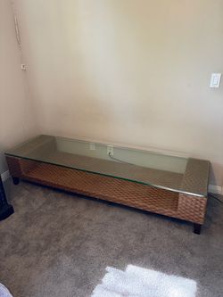 Wicker and Glass Top TV Stand